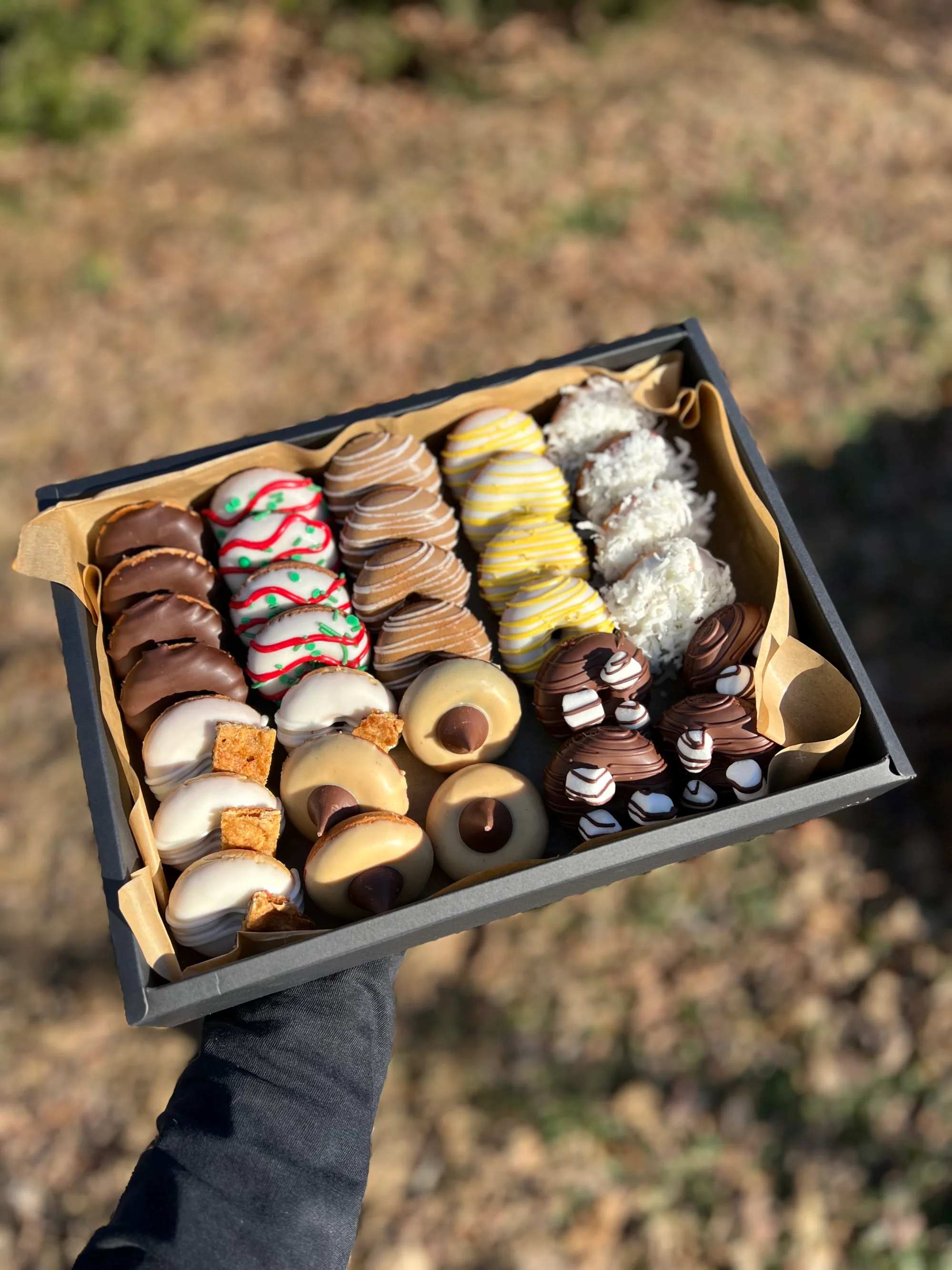A celebration box of gluten-free chocolate-dipped treats and cookies