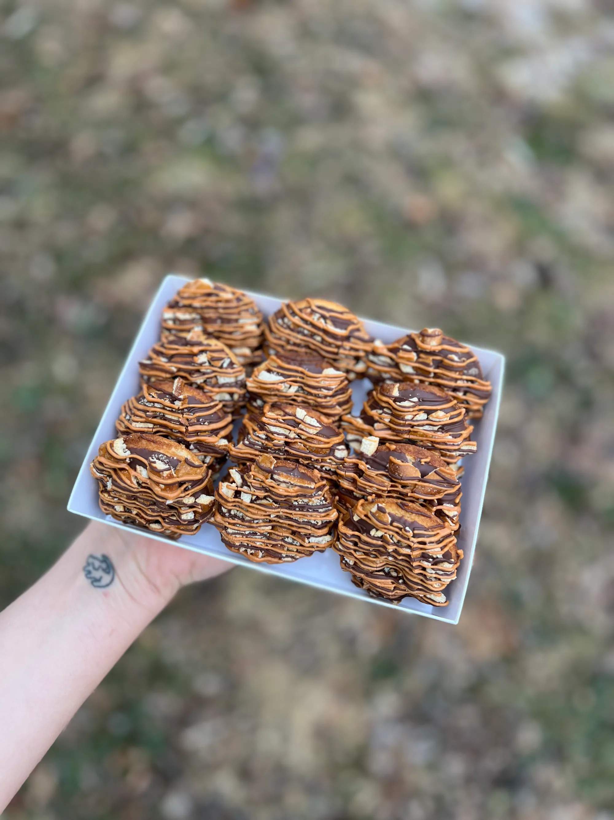 Hand-drizzled gluten-free samoa-style cookies